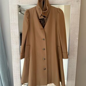 Tan Trench Coat with High Collar and Tailored Silhouette